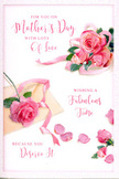 The image shows an elegant Mother's Day card, styled like a floral still life captured on paper, with a scattering of soft pink roses and petals that evoke the romance of springtime in Hither Green. At the centre of the design, a loose cluster of roses unfurls across the card, their petals layered in shades from pale blush to richer rose, each bloom open enough to reveal its full, rounded heart. The flowers are illustrated or printed with realistic shading that creates gentle depth, making the petals appear almost velvety to the touch, as though you could lean in and catch a whisper of classic rose fragrance drifting from a garden near Hither Green Station. Around the main cluster, single petals flutter outward and come to rest at different angles, giving the scene a natural, unposed charm, like the trace of a bouquet softly shaken out after a long walk home along Hither Green Lane. Delicate green leaves frame and punctuate the arrangement, adding cool contrast and freshness, while a pale, satin-like ribbon winds gracefully through the roses, with loose ends curling in relaxed arcs, reminiscent of a florist's final flourish when finishing a hand-tied bunch. Above the flowers, flowing, hand-drawn script spells out a warm Mother's Day message, the letters airy and slightly swirling, suggesting an affectionate, handwritten note. The lighting remains soft and even, free of harsh contrast, wrapping the entire card in a sense of calm and warmth. It feels like a visual hug, perfectly suited to accompany a bouquet or doorstep flower delivery to mums across Hither Green and the nearby residential streets.